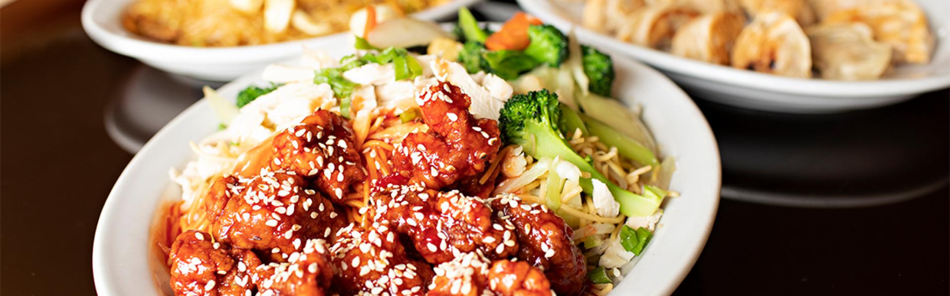A plate of chicken meatballs with salad Fried Prawns and fried rice