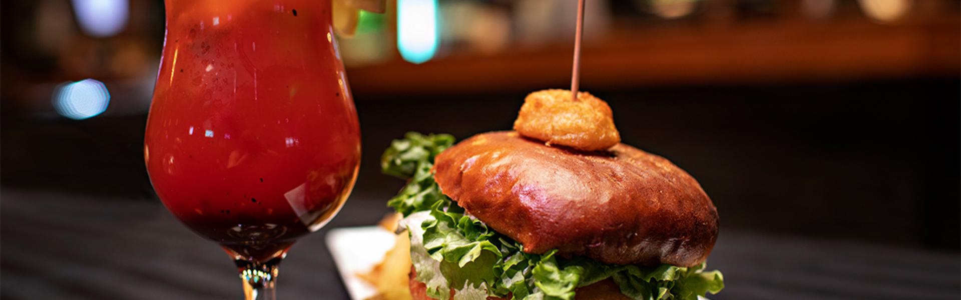 Burger with a glass of beverage 